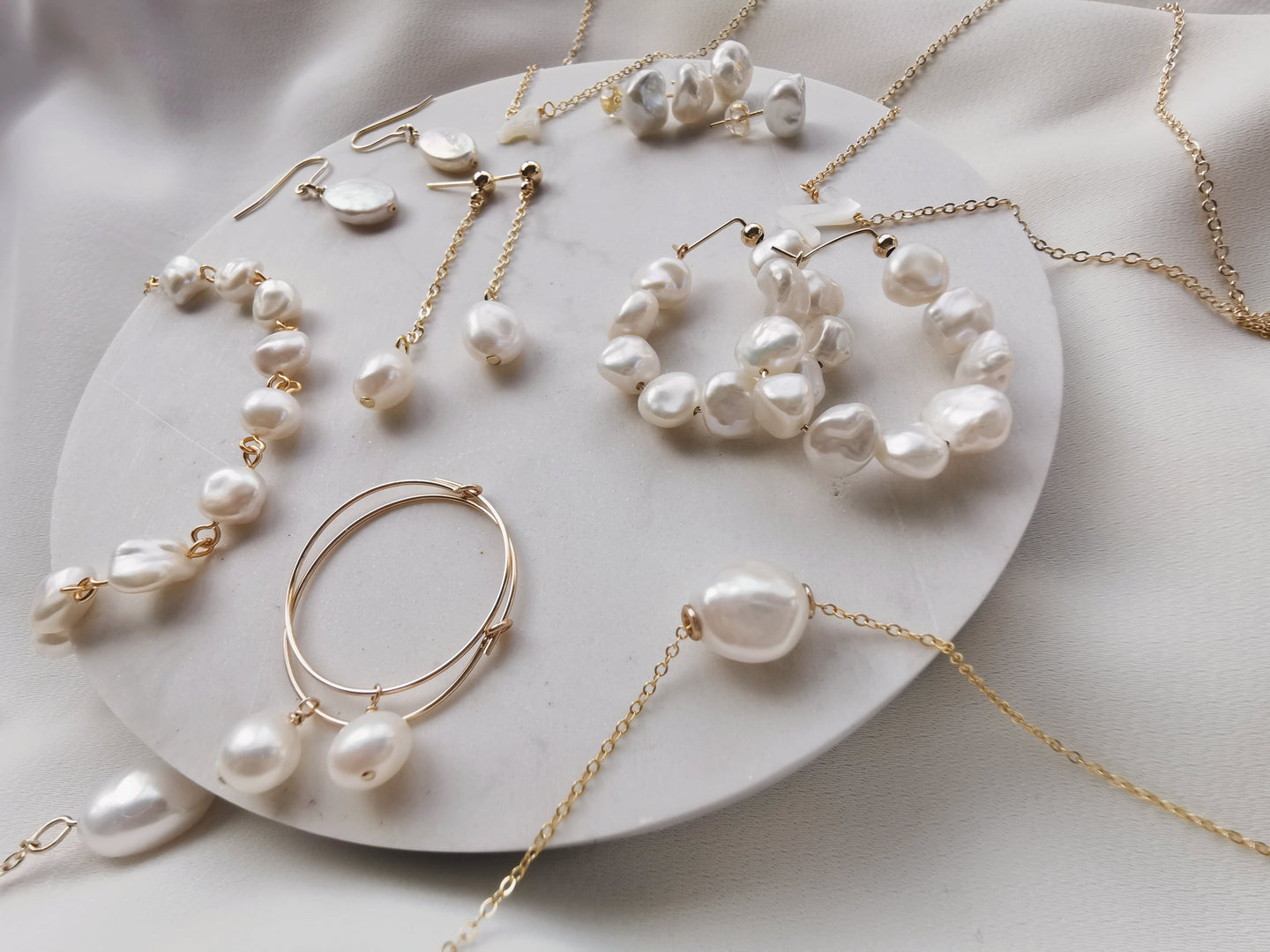  pearl hoops  hoops earrings huggies  pearl earrings  freshwater pearl pendant pearl breacelet pearl ear studs fashion jewellery Keshi pearl jewellery zenelia jewel collection